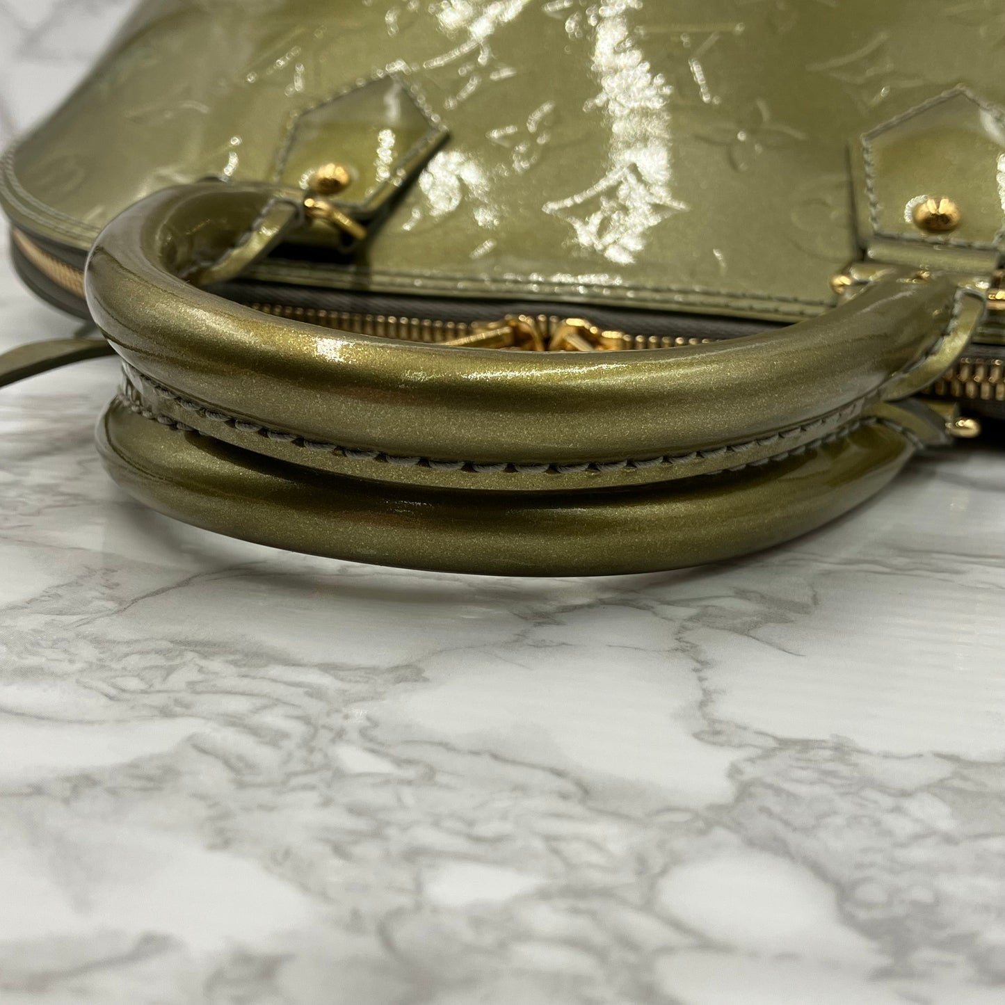 LOUIS VUITTON Vernis Alma handbag