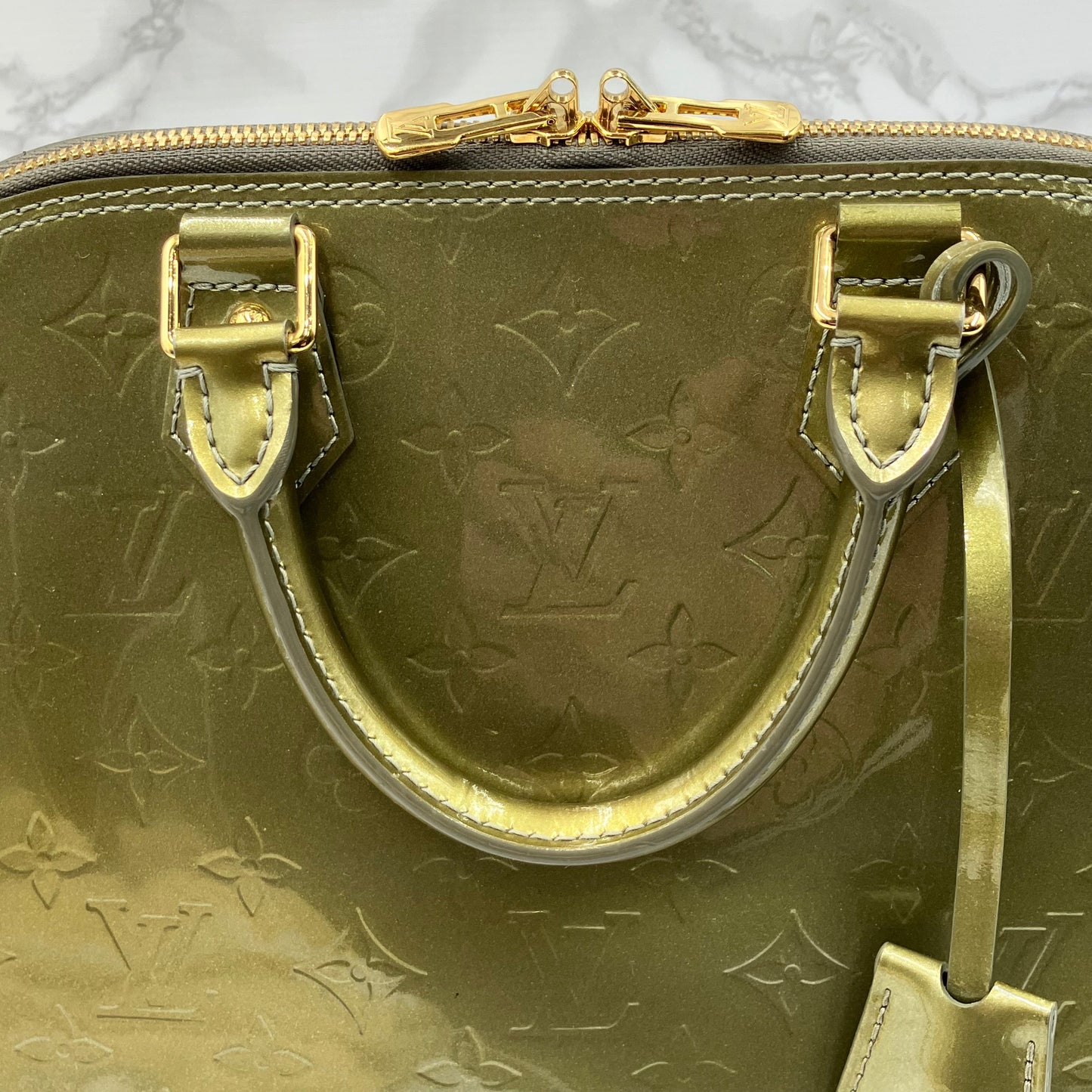 LOUIS VUITTON Vernis Alma handbag