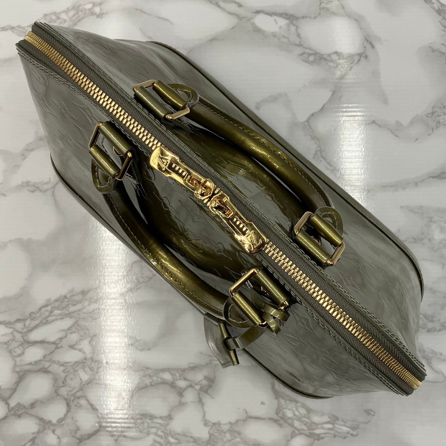 LOUIS VUITTON Vernis Alma handbag