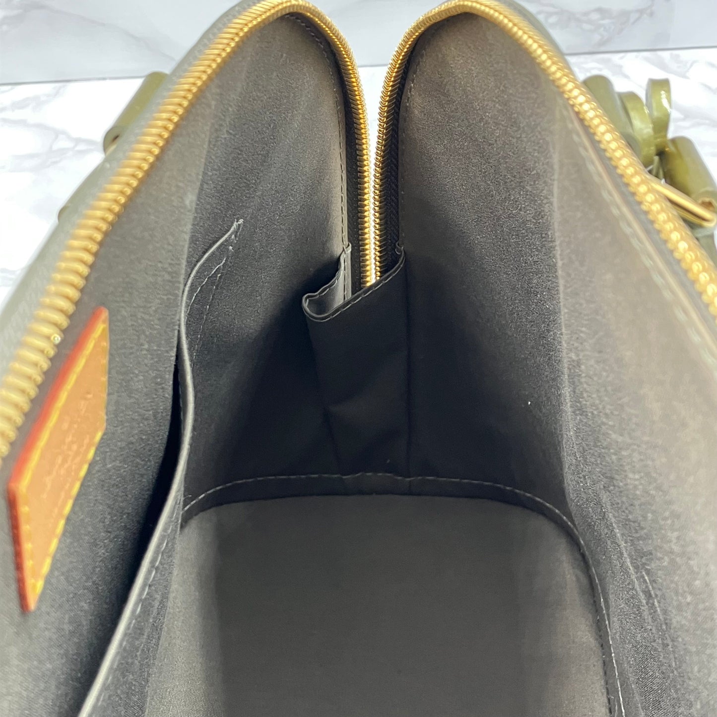 LOUIS VUITTON Vernis Alma handbag