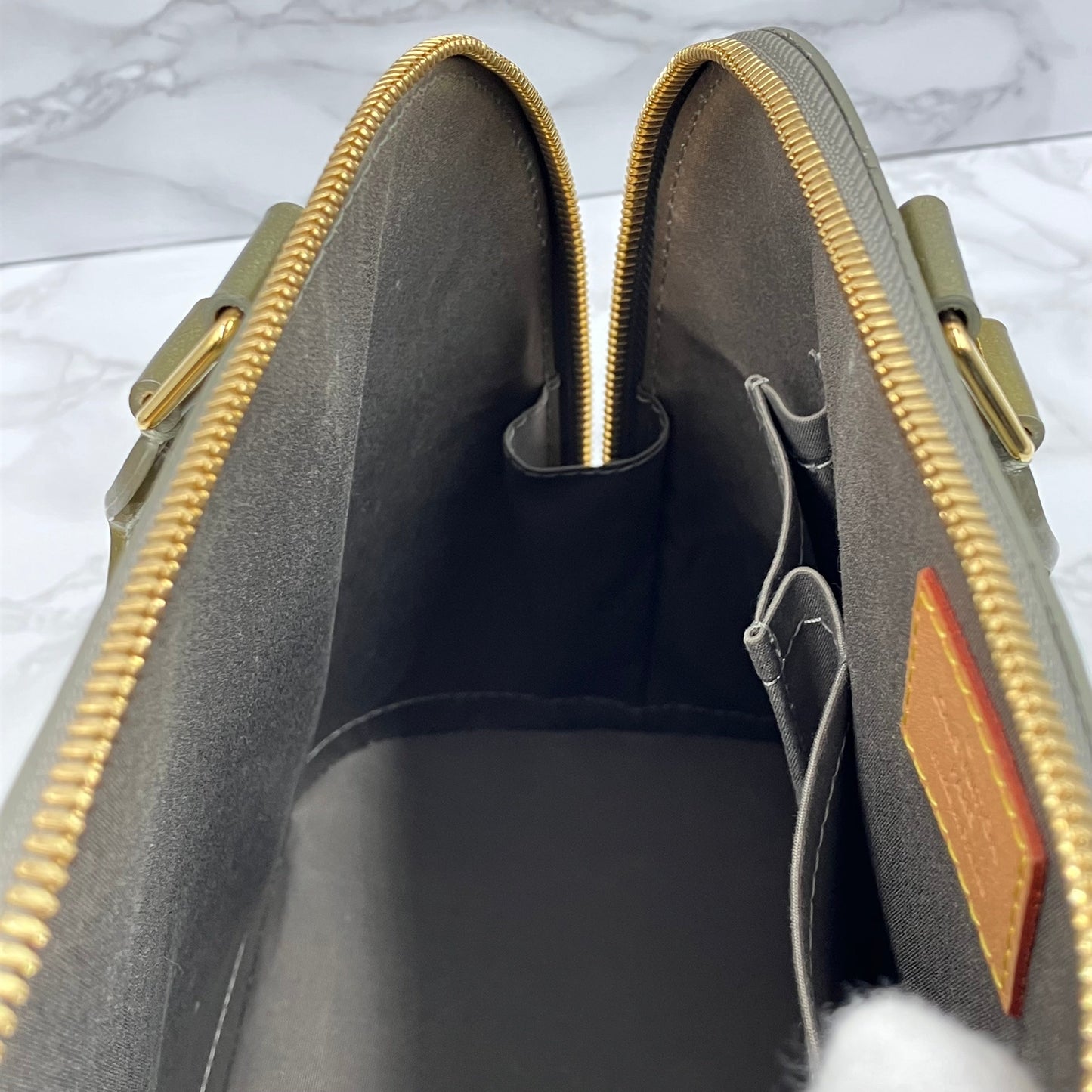 LOUIS VUITTON Vernis Alma handbag