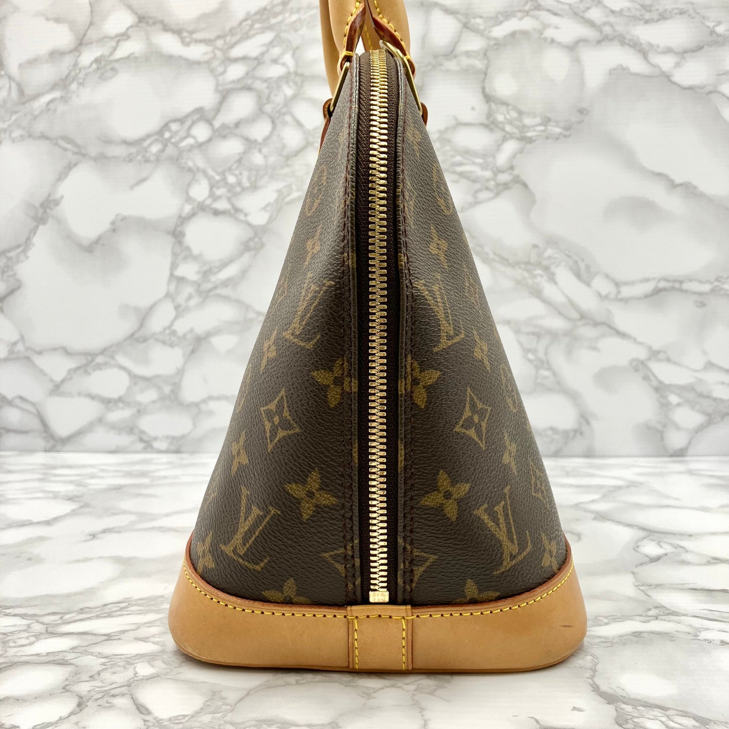 LOUIS VUITTON Monogram Alma PM