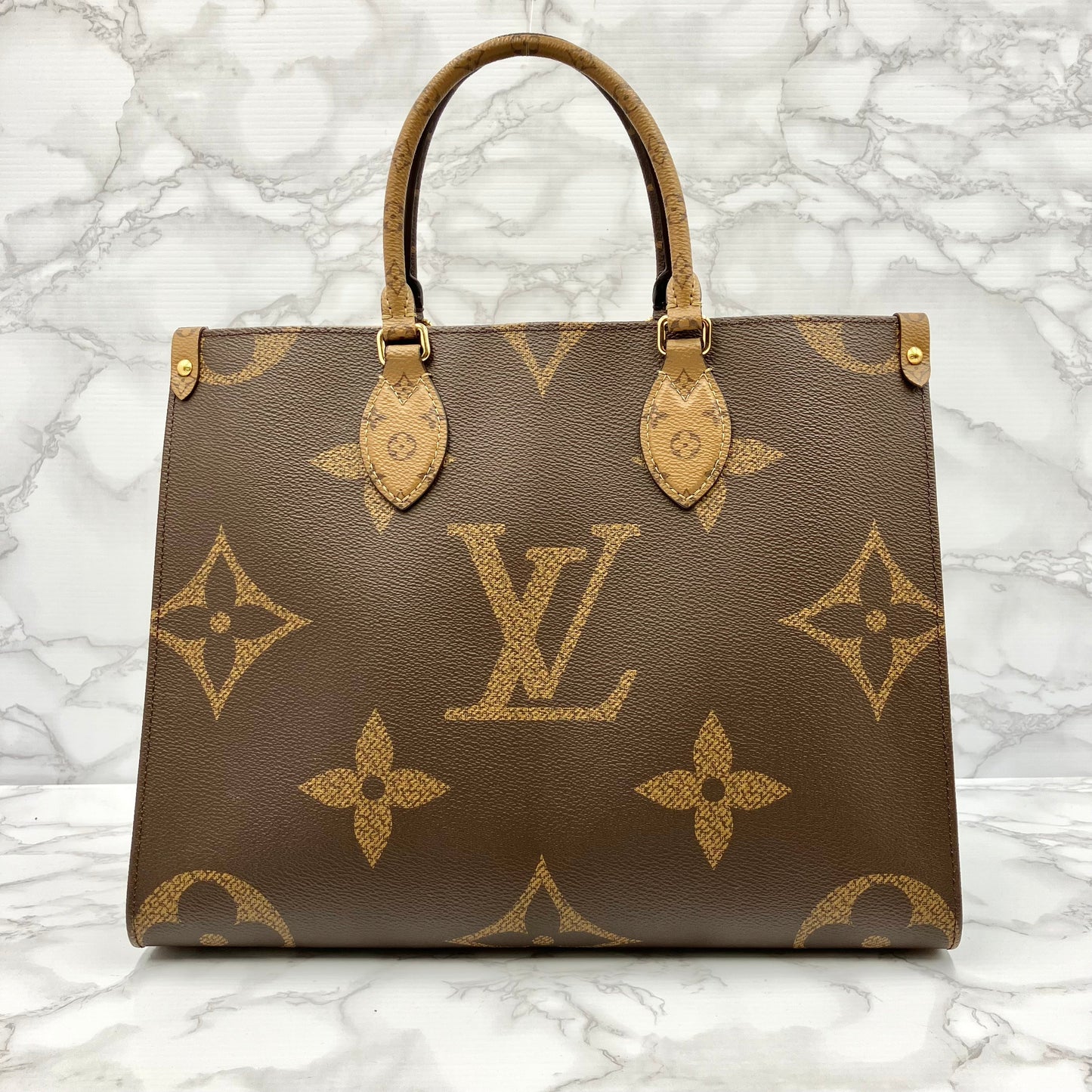 LOUIS VUITTON Monogram Giant Reverse On The Go MM