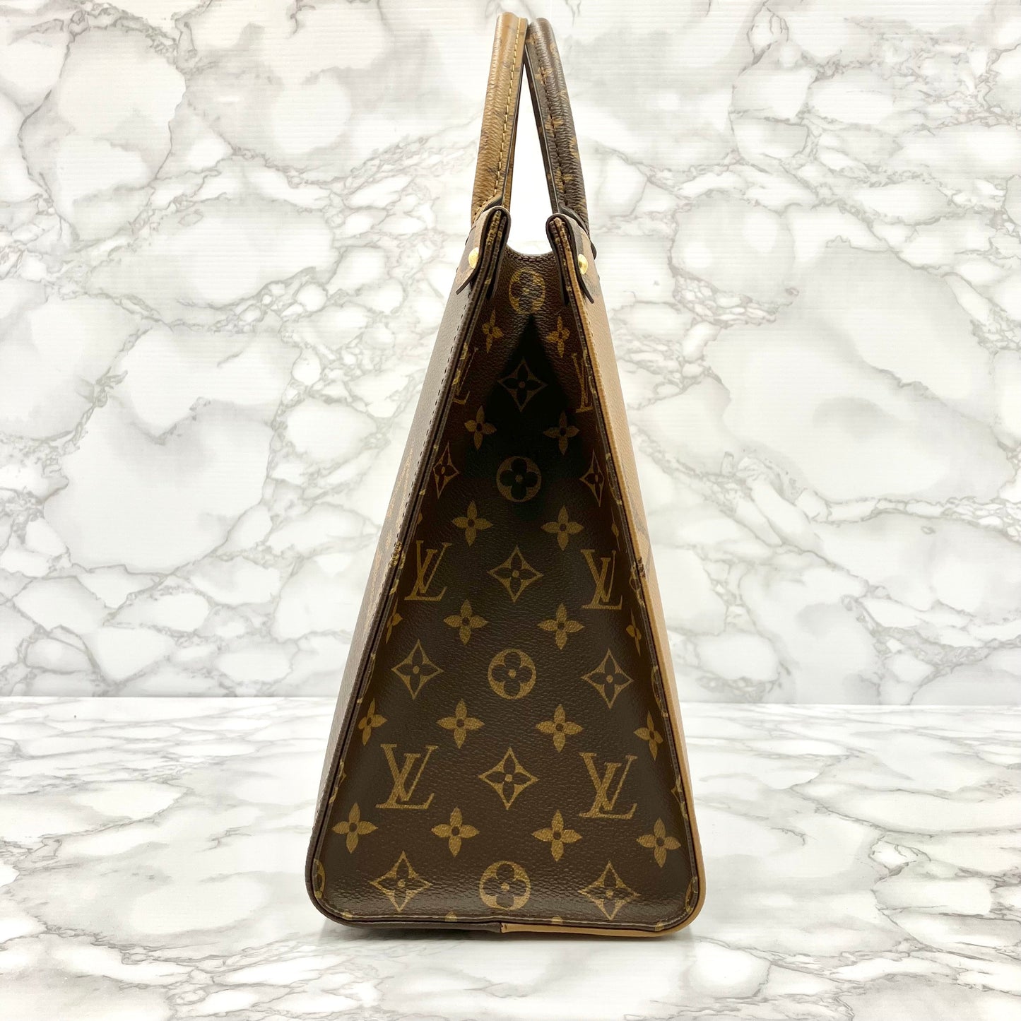 LOUIS VUITTON Monogram Giant Reverse On The Go MM