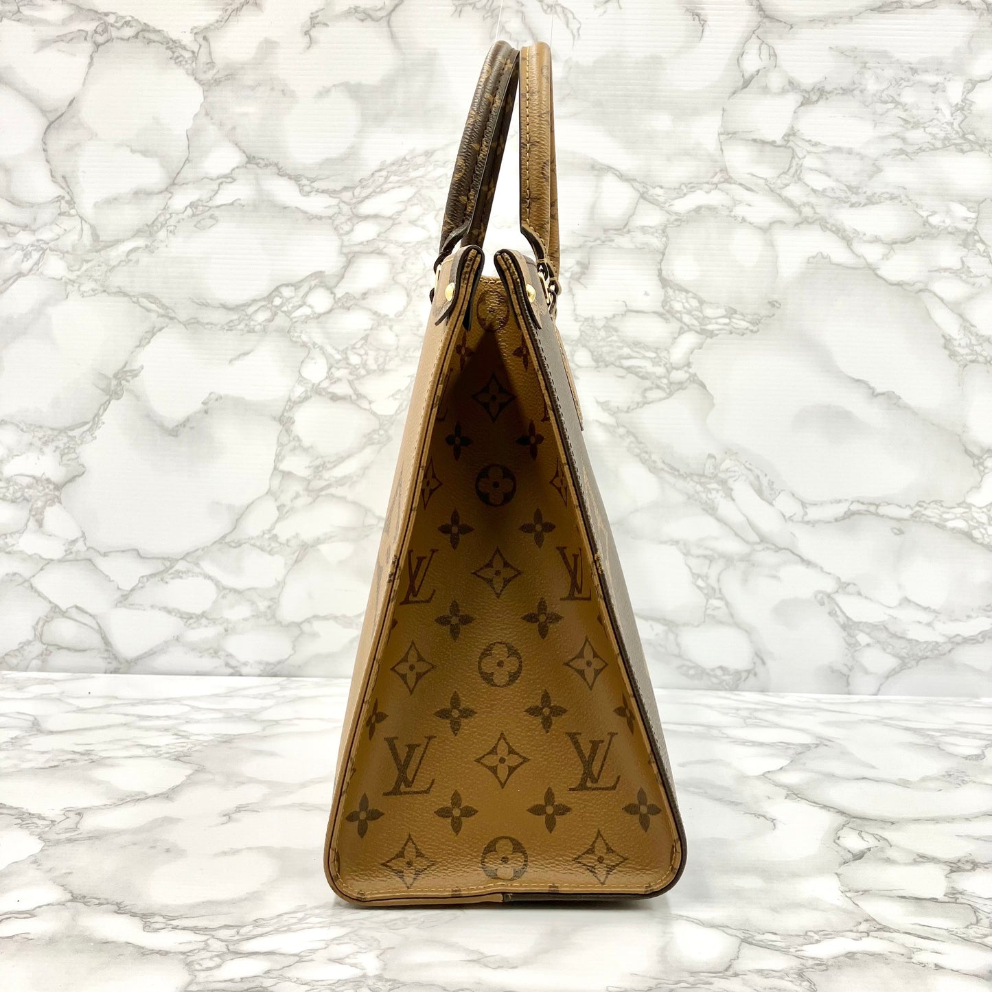 LOUIS VUITTON Monogram Giant Reverse On The Go MM