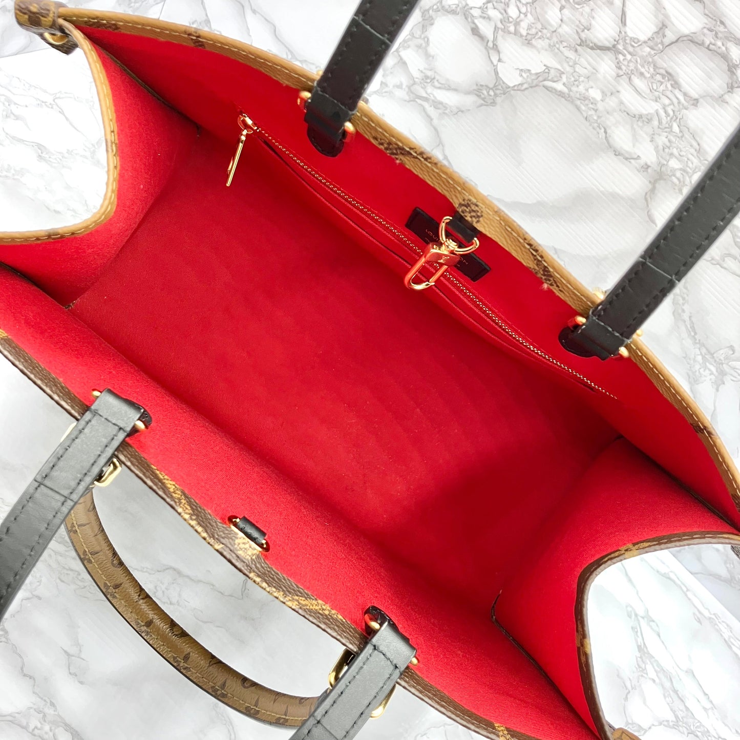 LOUIS VUITTON Monogram Giant Reverse On The Go MM