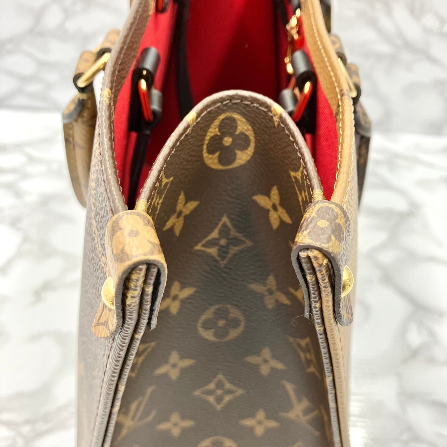 LOUIS VUITTON Monogram Giant Reverse On The Go MM