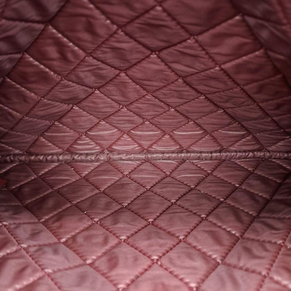 Red Leather Chanel Clutch