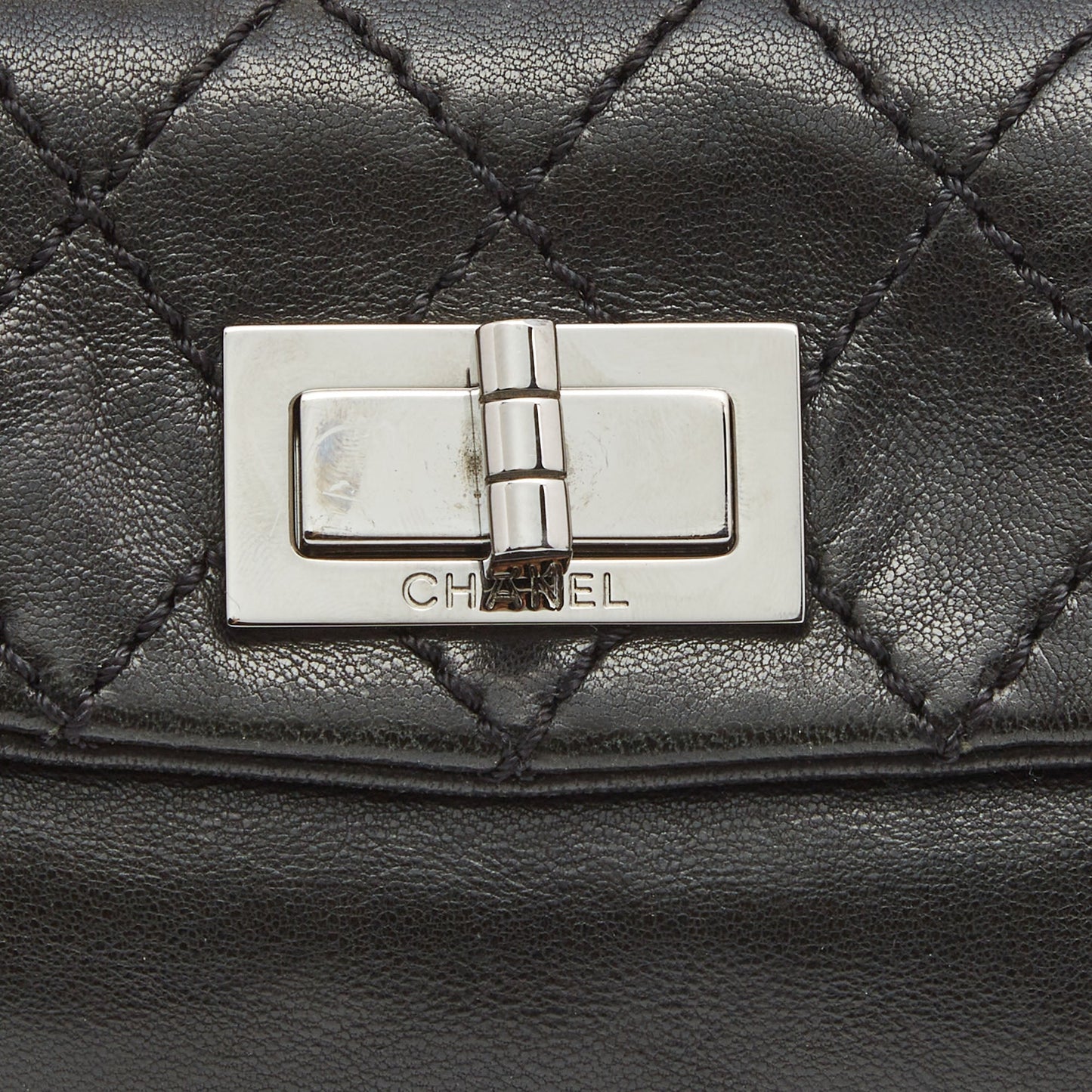 CHANEL Black Quilted Leather Mademoiselle Flap Clutch