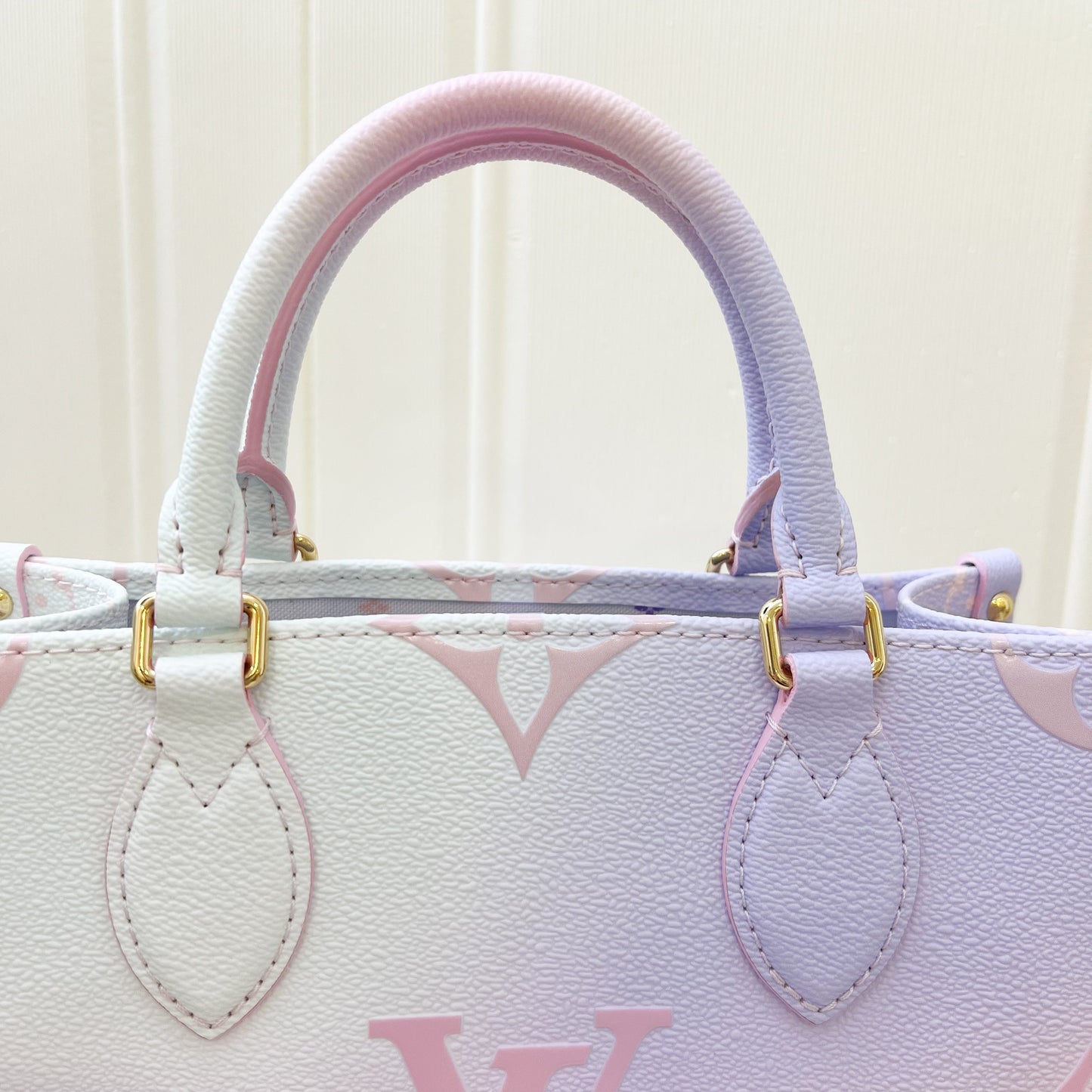 LV Onthego PM in Pastel Sunrise Monogram Empreinte Leather GHW