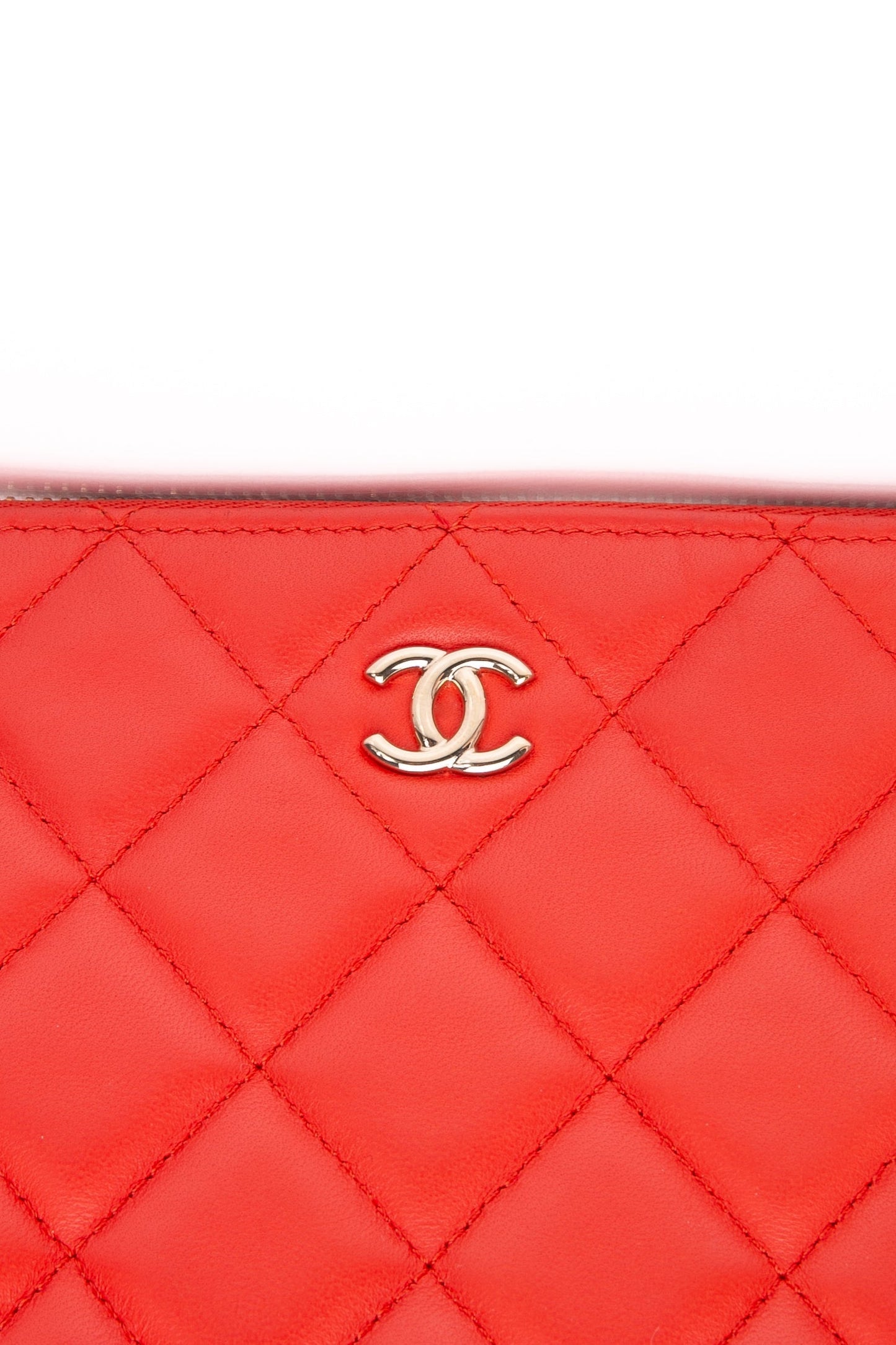 CHANEL Coral Lambskin Quilted Medium O Case Clutch