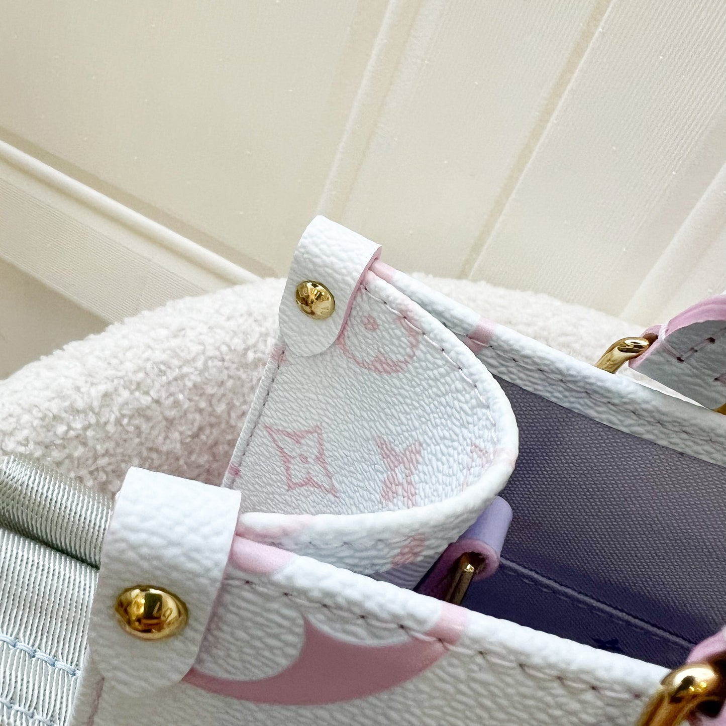 LV Onthego PM in Pastel Sunrise Monogram Empreinte Leather GHW