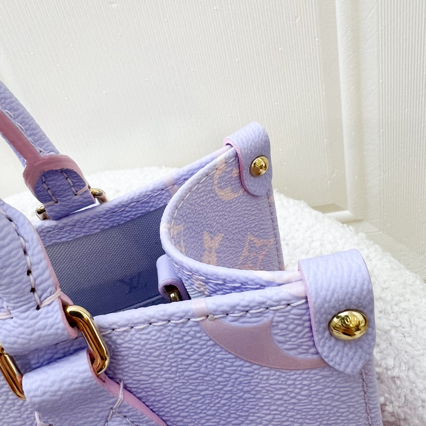 LV Onthego PM in Pastel Sunrise Monogram Empreinte Leather GHW