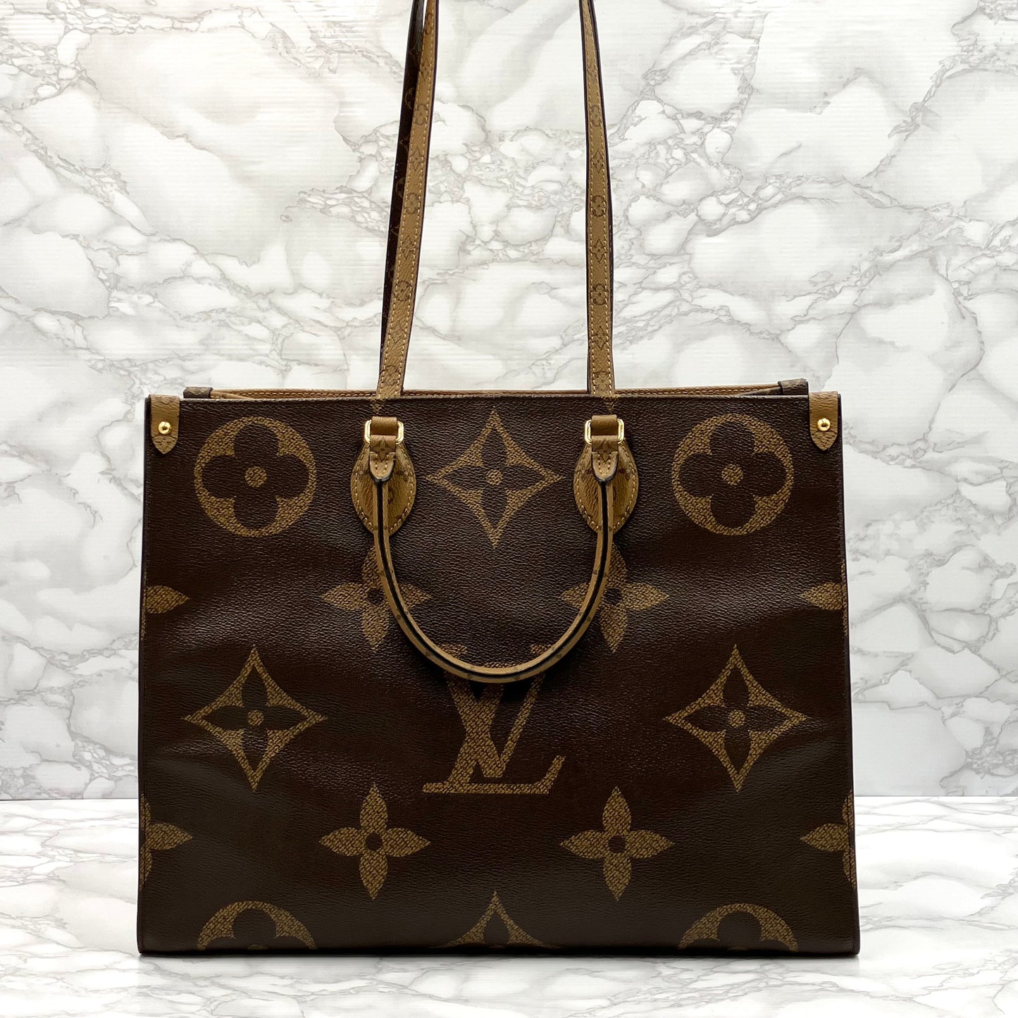 LOUIS VUITTON On The Go GM Monogram Giant Reverse