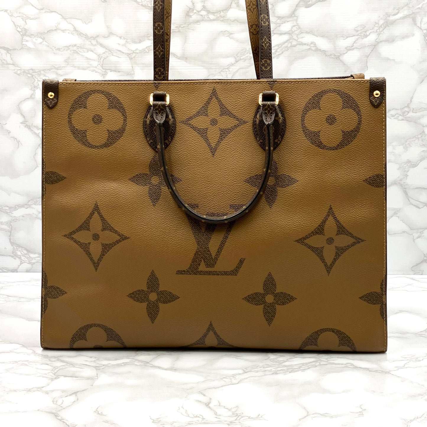 LOUIS VUITTON On The Go GM Monogram Giant Reverse