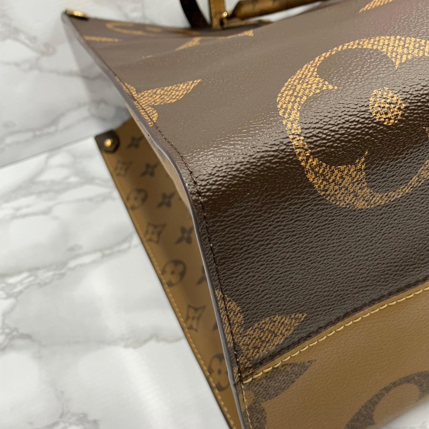 LOUIS VUITTON On The Go GM Monogram Giant Reverse