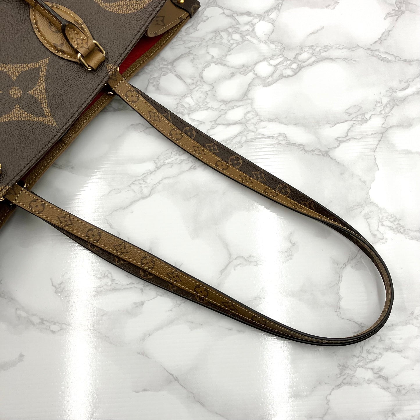 LOUIS VUITTON On The Go GM Monogram Giant Reverse
