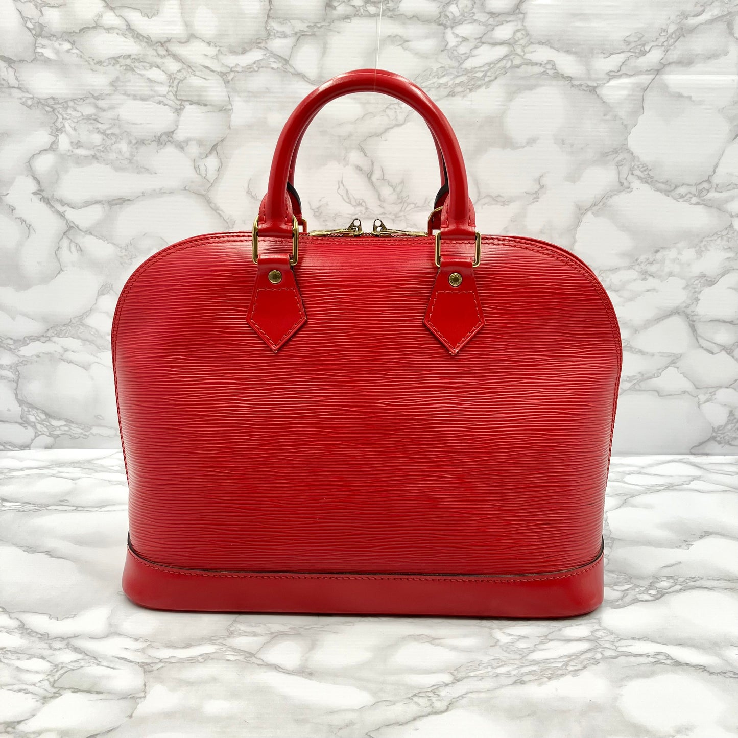 LOUIS VUITTON Epi Alma PM