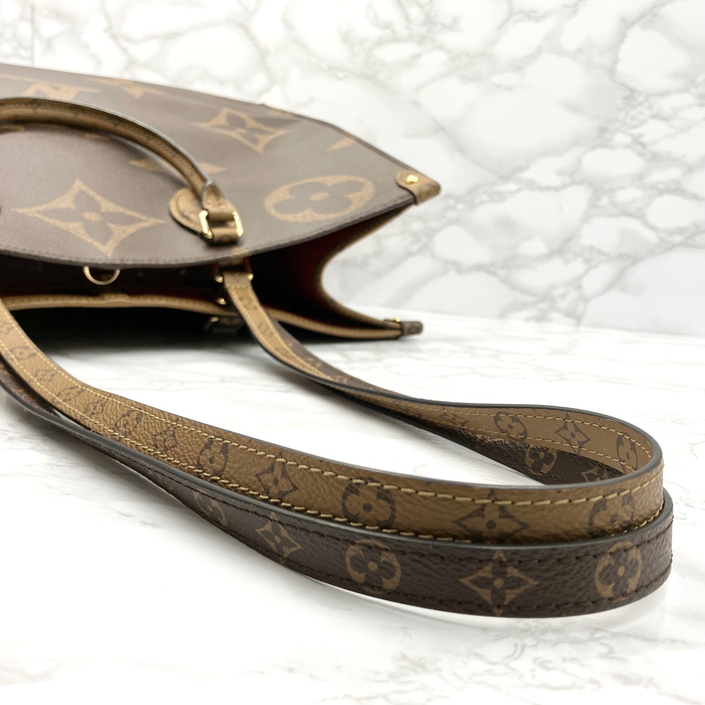 LOUIS VUITTON On The Go GM Monogram Giant Reverse