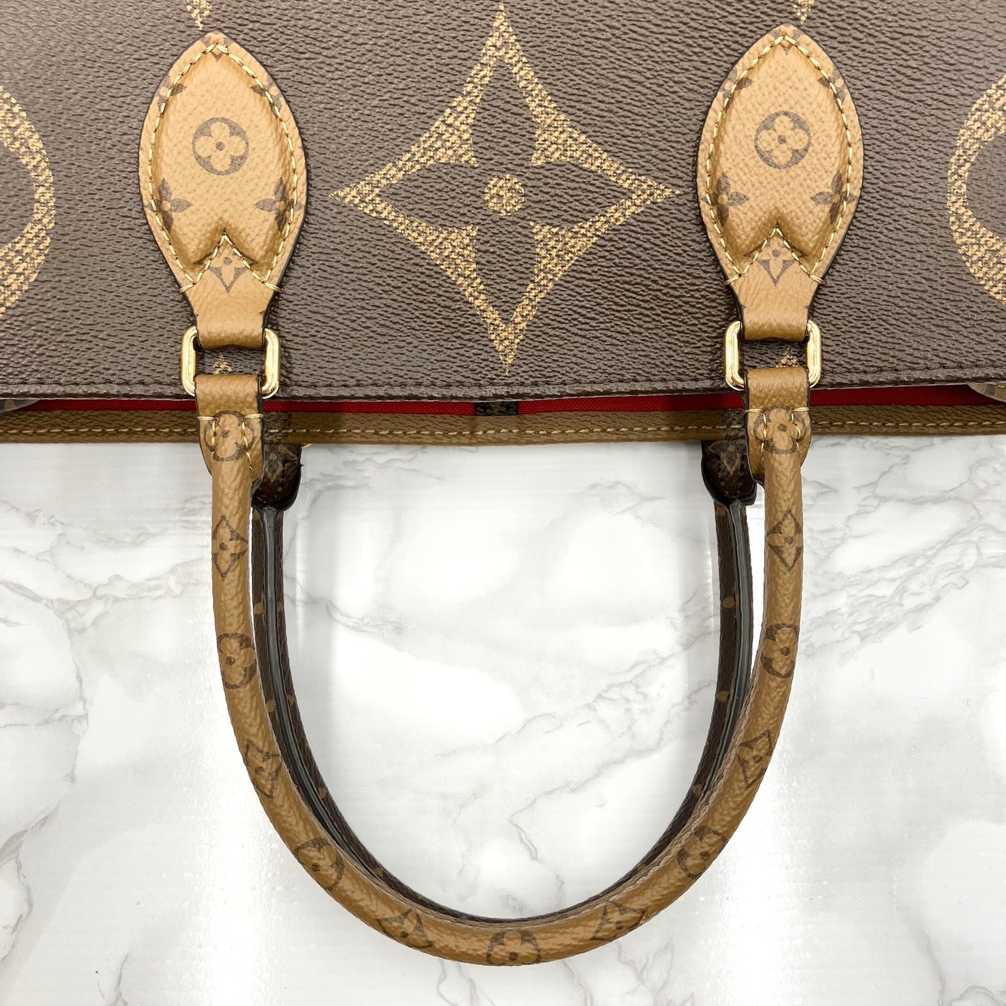 LOUIS VUITTON On The Go GM Monogram Giant Reverse