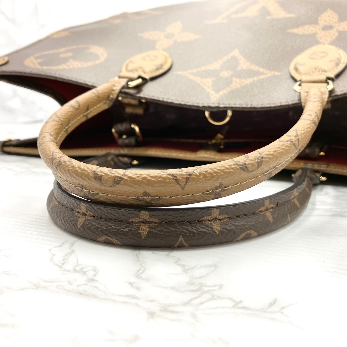 LOUIS VUITTON On The Go GM Monogram Giant Reverse