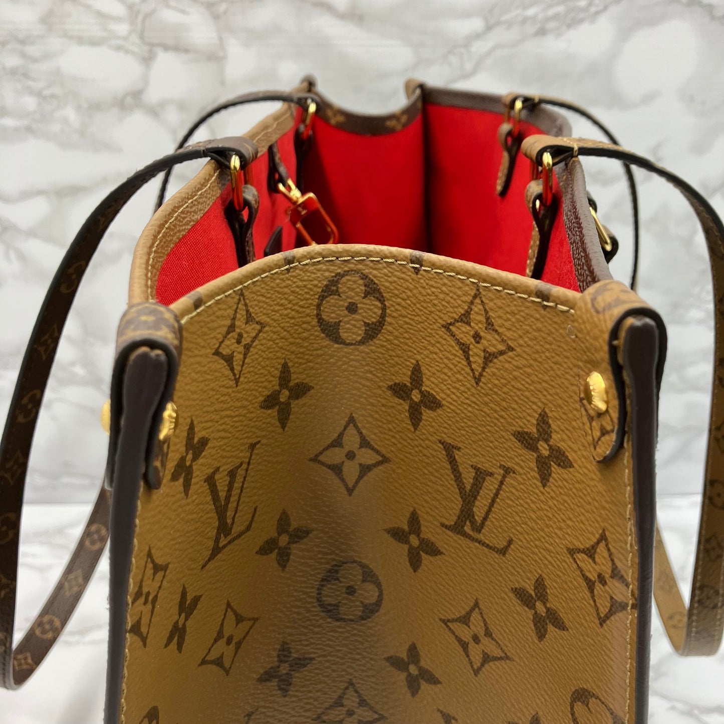 LOUIS VUITTON On The Go GM Monogram Giant Reverse