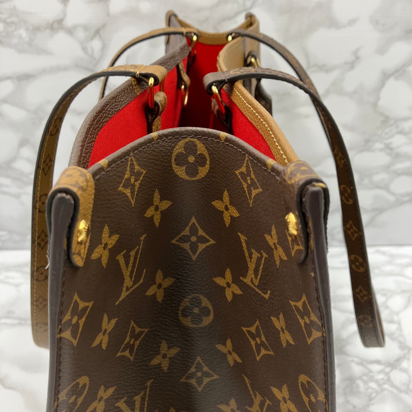 LOUIS VUITTON On The Go GM Monogram Giant Reverse
