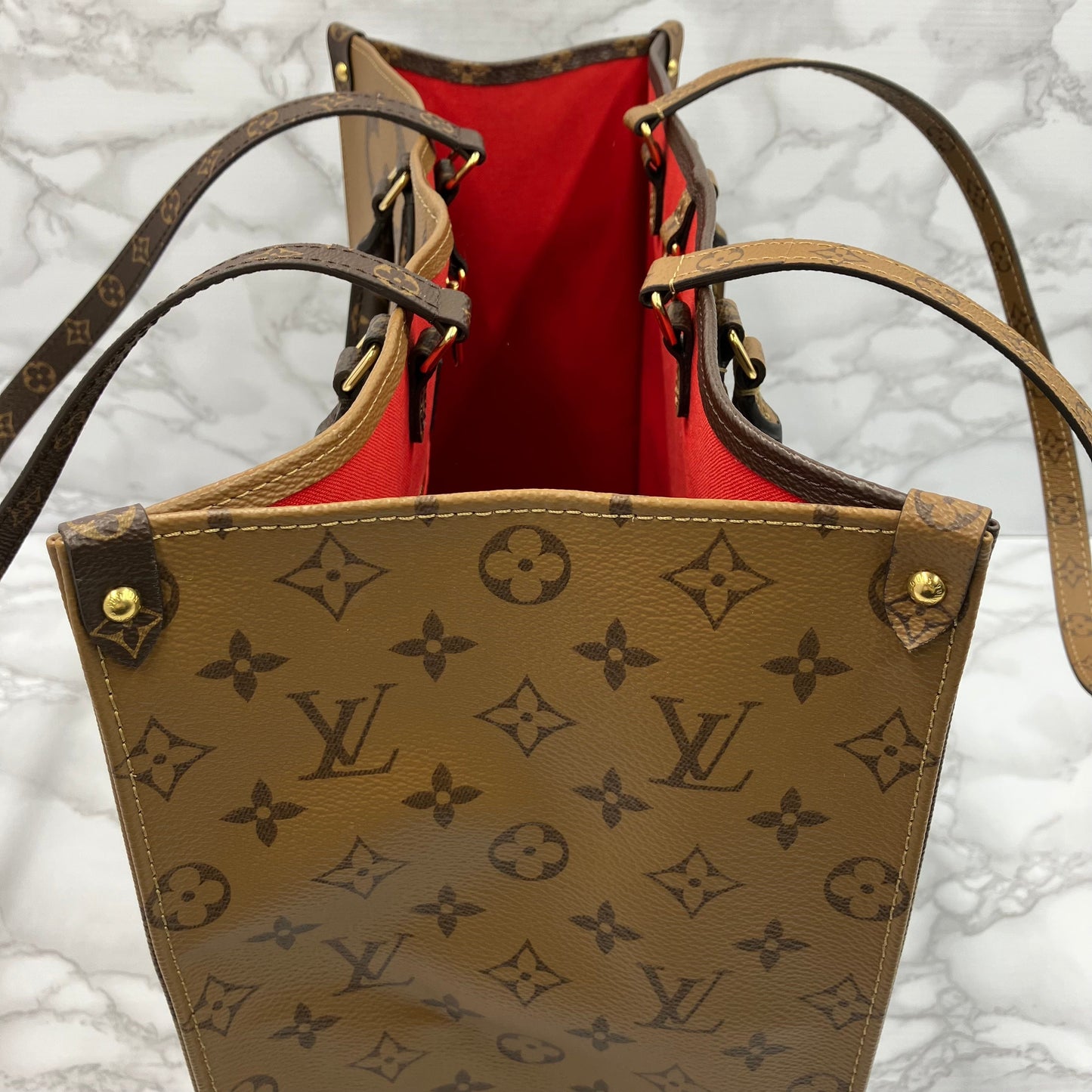 LOUIS VUITTON On The Go GM Monogram Giant Reverse