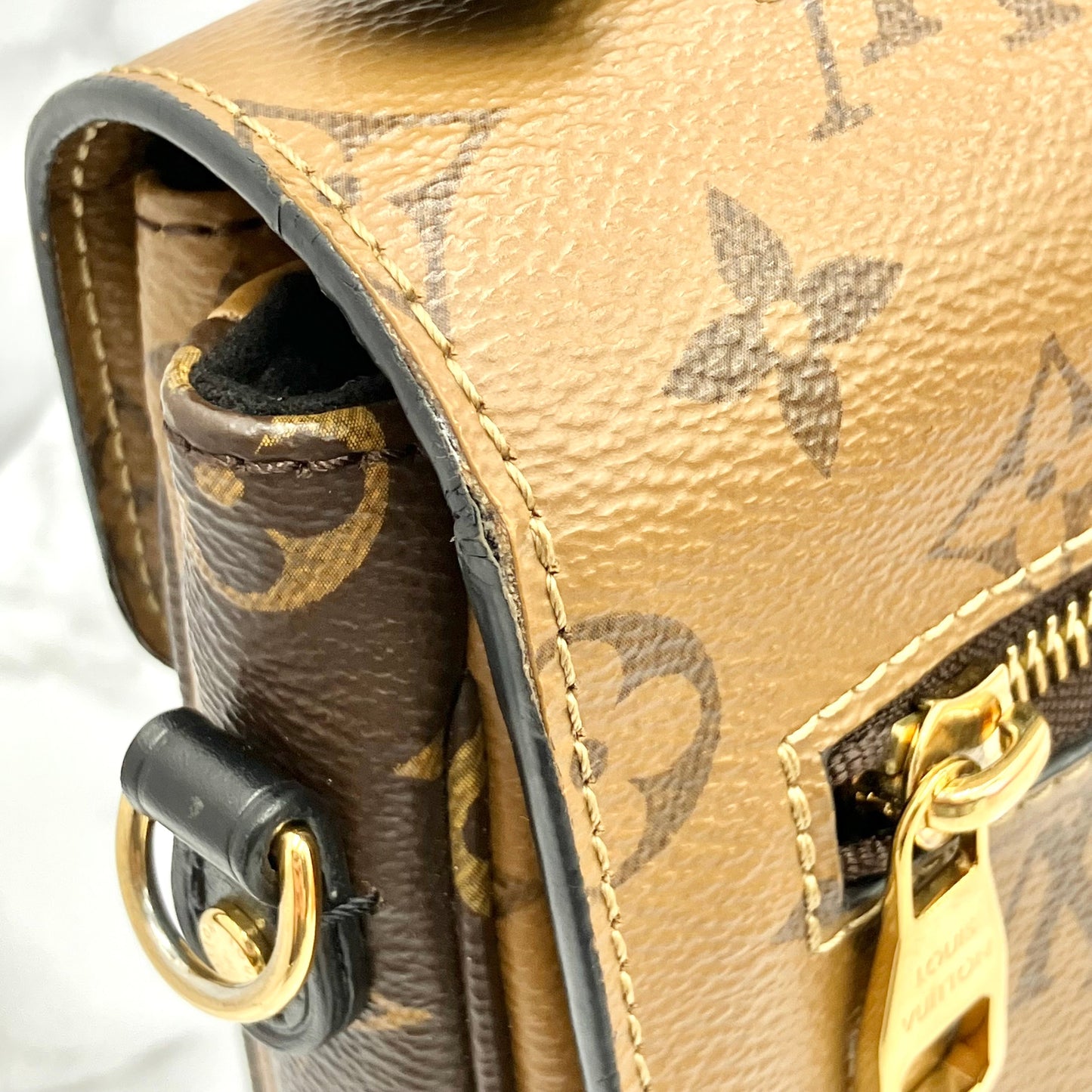 LOUIS VUITTON Monogram Reverse Metis
