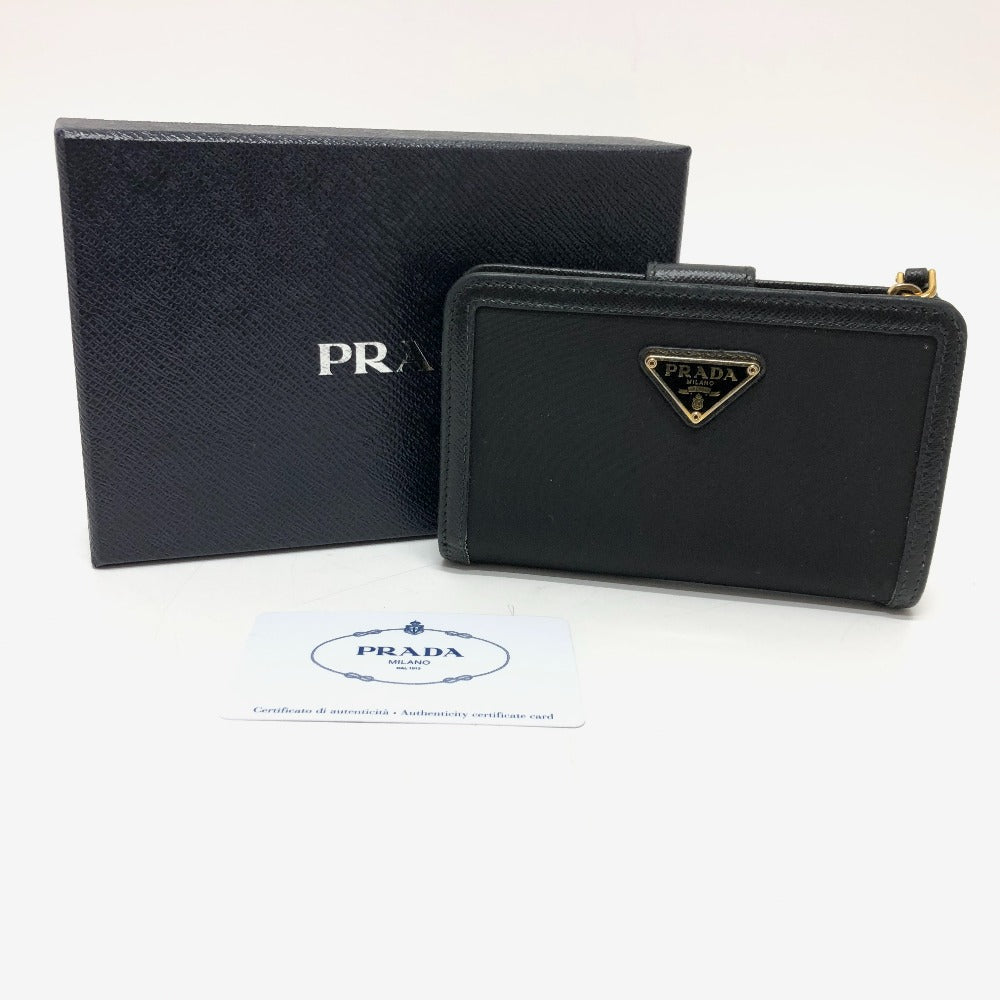 PRADA Folded wallet 1ML225 Nylon leather black triangle plate Women Used