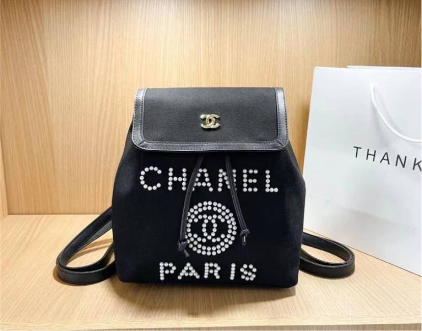 Chanel woman pearl bead Backpack