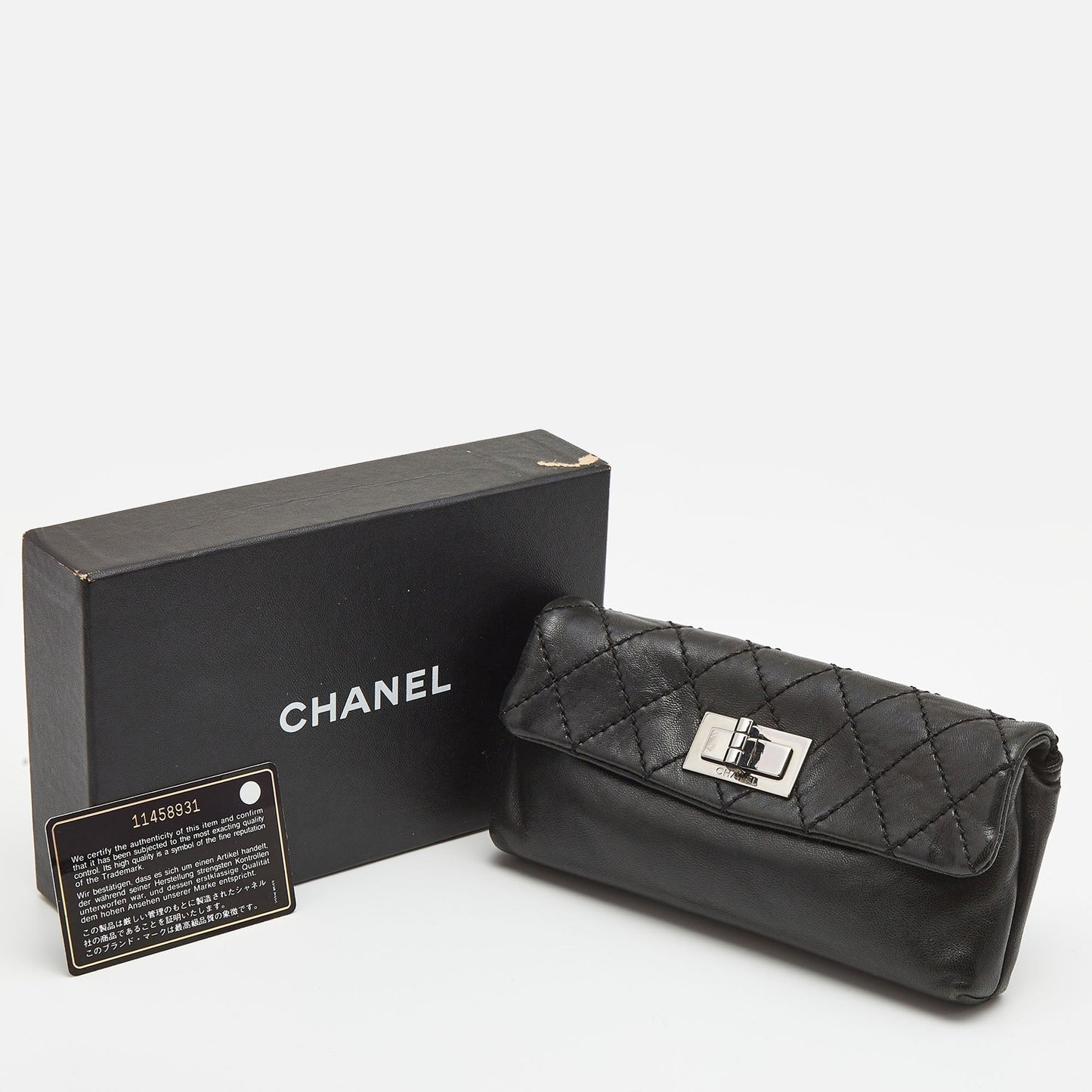 CHANEL Black Quilted Leather Mademoiselle Flap Clutch